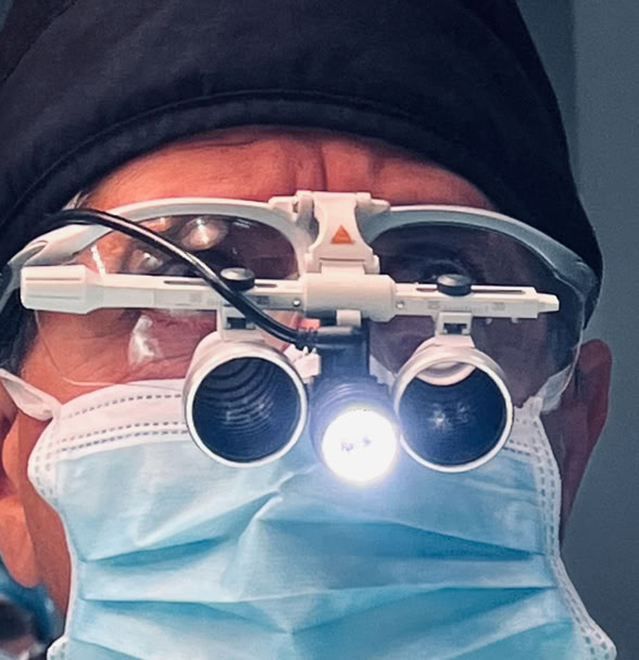 Close-up of a healthcare professional's hands holding a stethoscope, focusing on medical care.